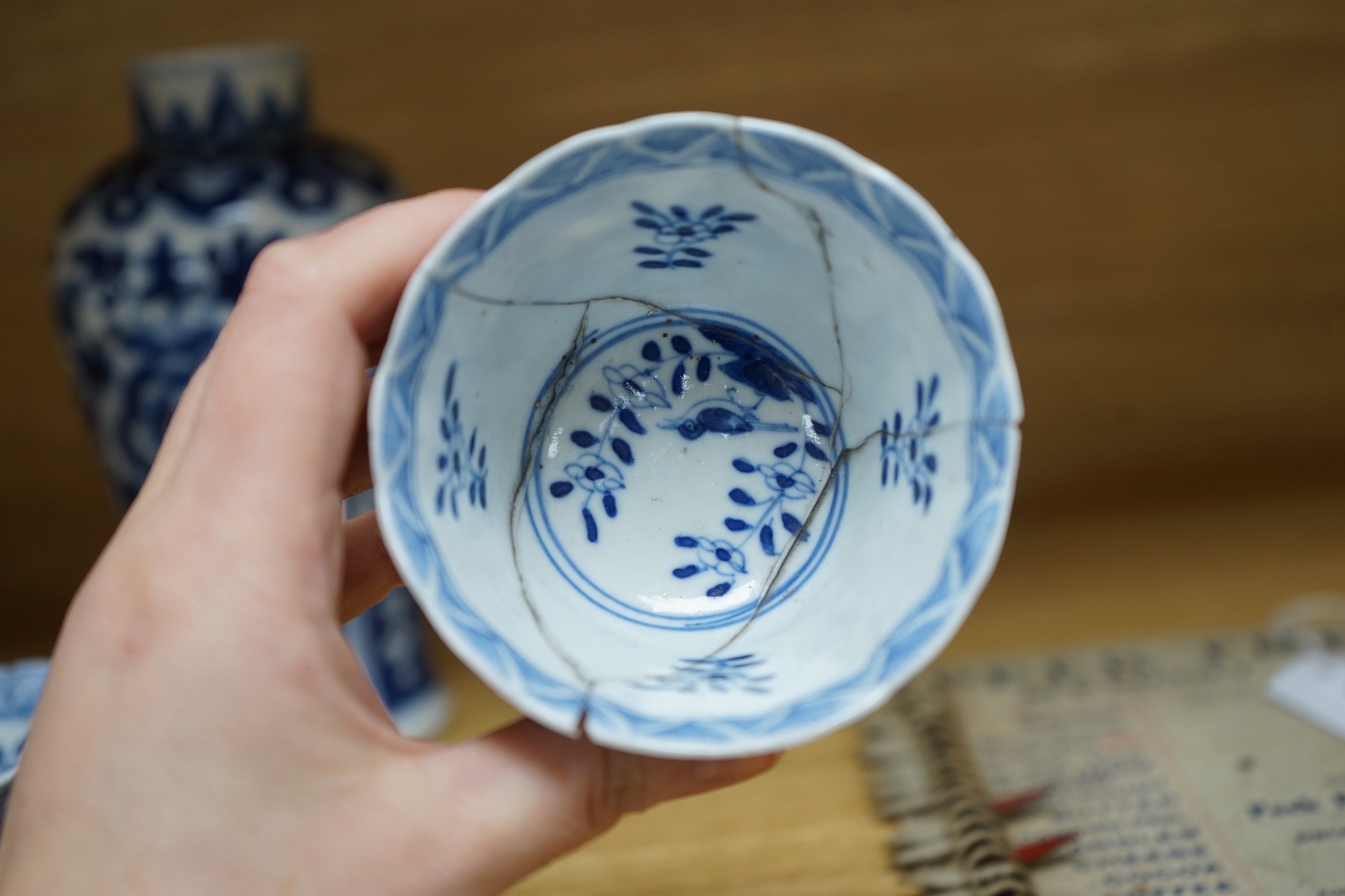 A Chinese blue and white phoenix decorated vase, a pair of circular boxes and a pair of damaged tea bowls. Late 19th century Tallest 17.5cm